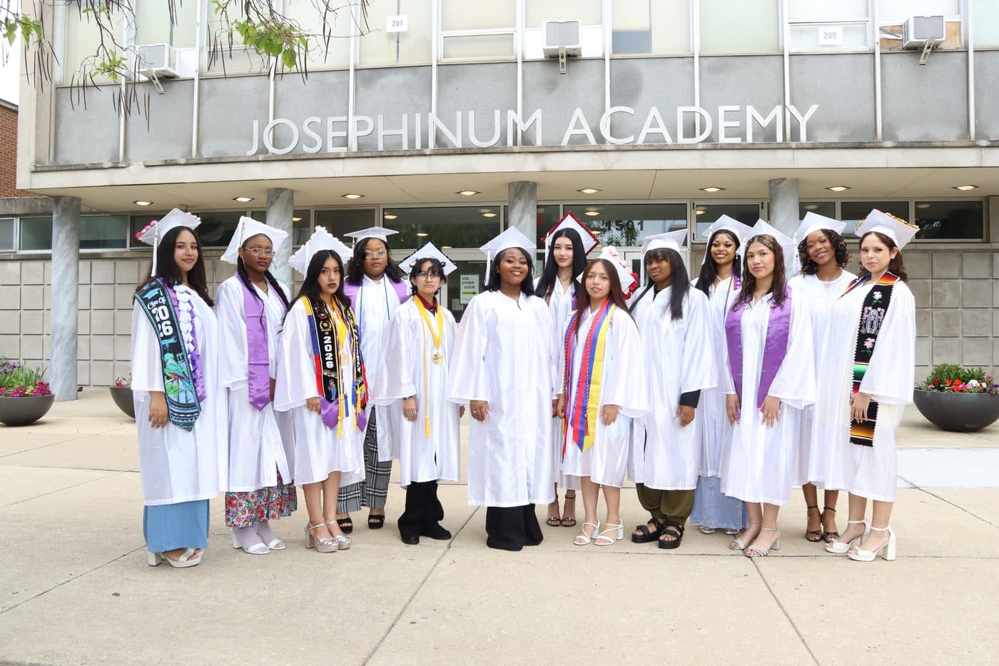 Josephinum graduates in caps and gowns outside the school