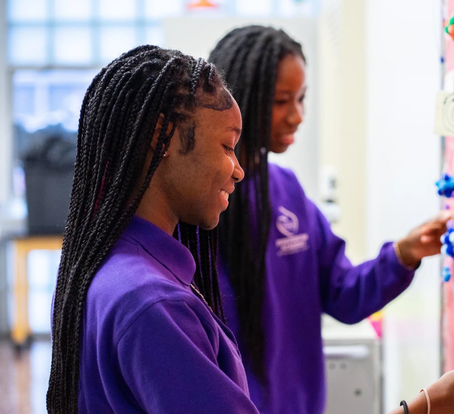 Josephinum Academy students working on a chemistry project in class