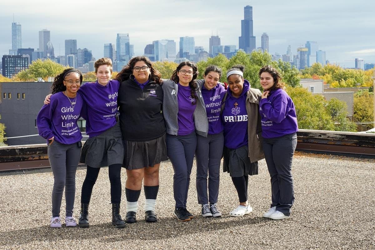 Josephinum students together with the Chicago skyline behind them